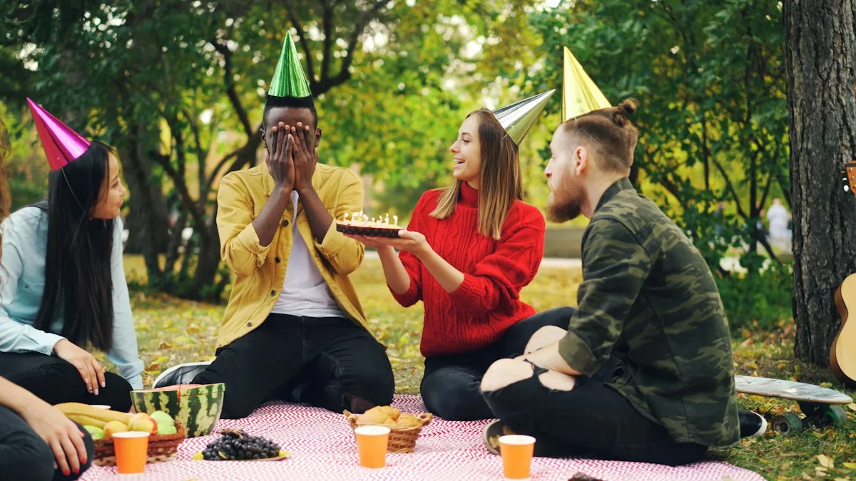Friends surprising the birthday person with a cake at a park picnic